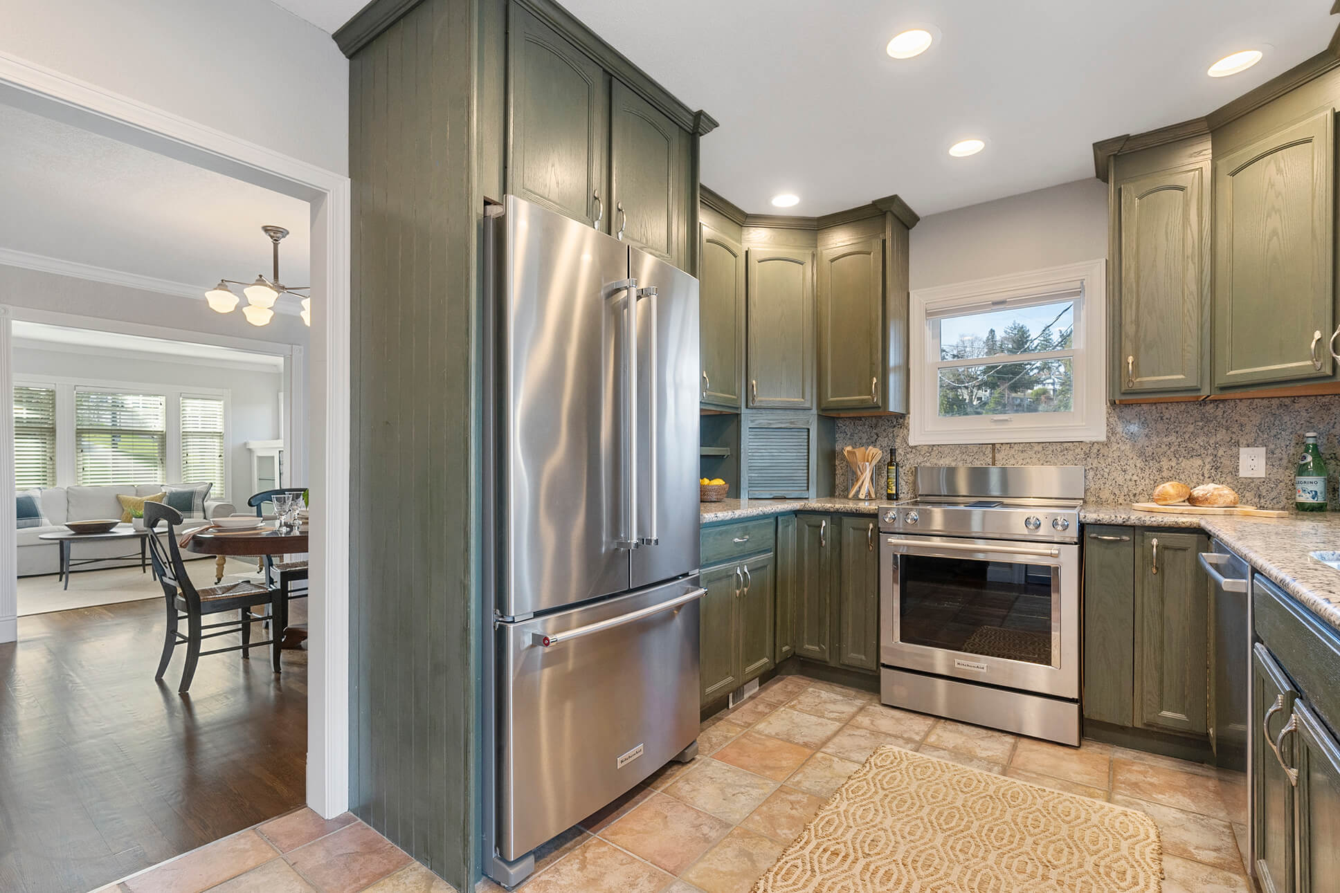 Updated kitchen with granite counters and stainless appliances