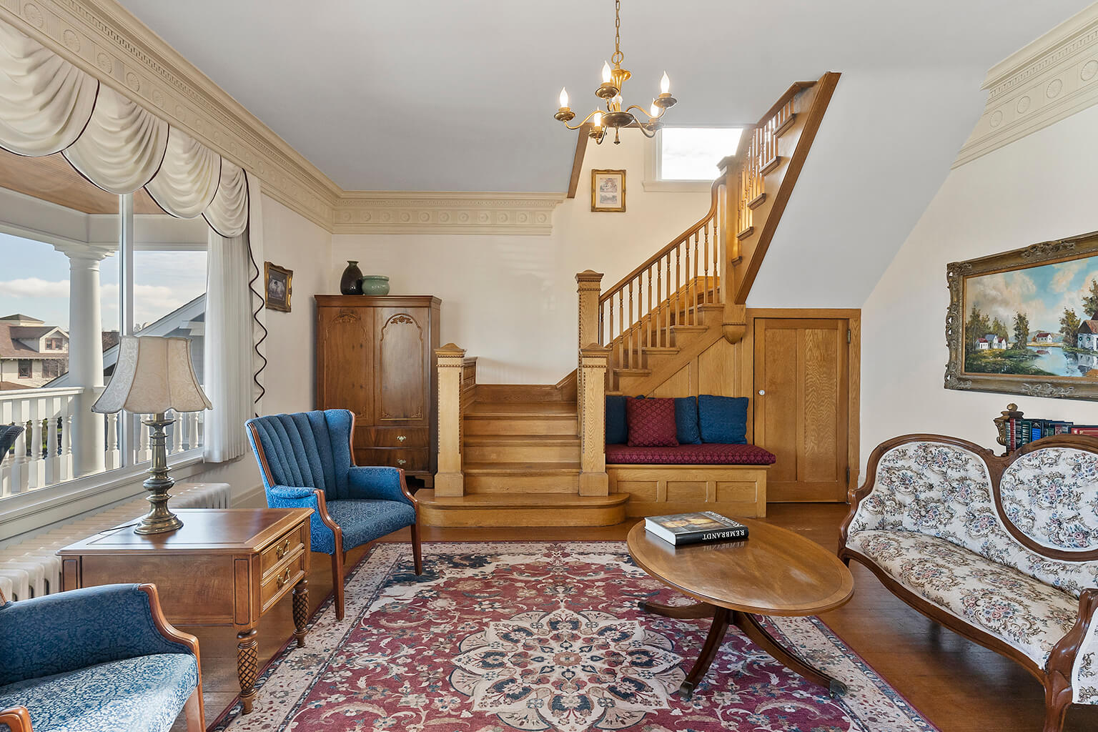 Impressive oak staircase in formal living room