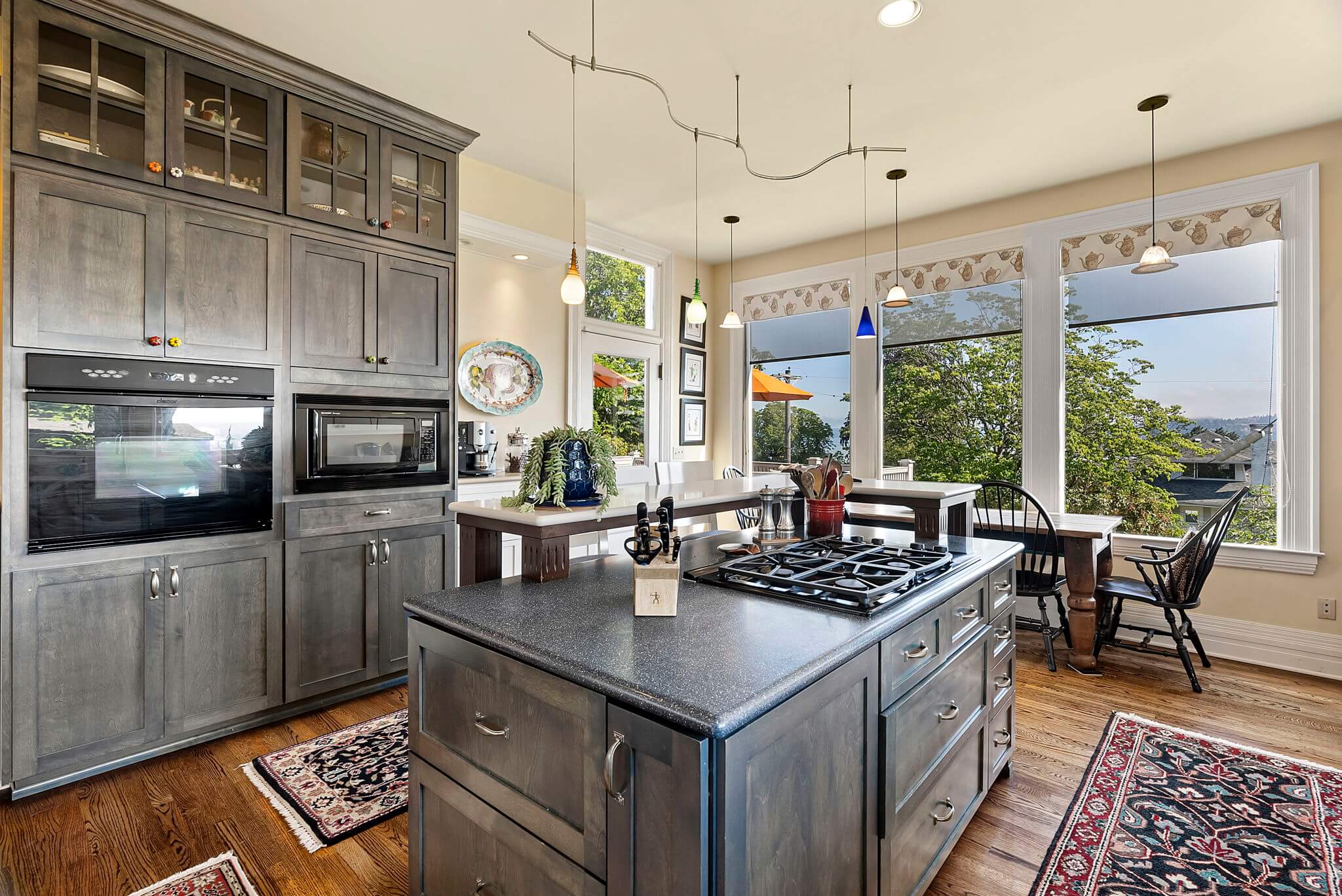 Kitchen features a central island and ample storage