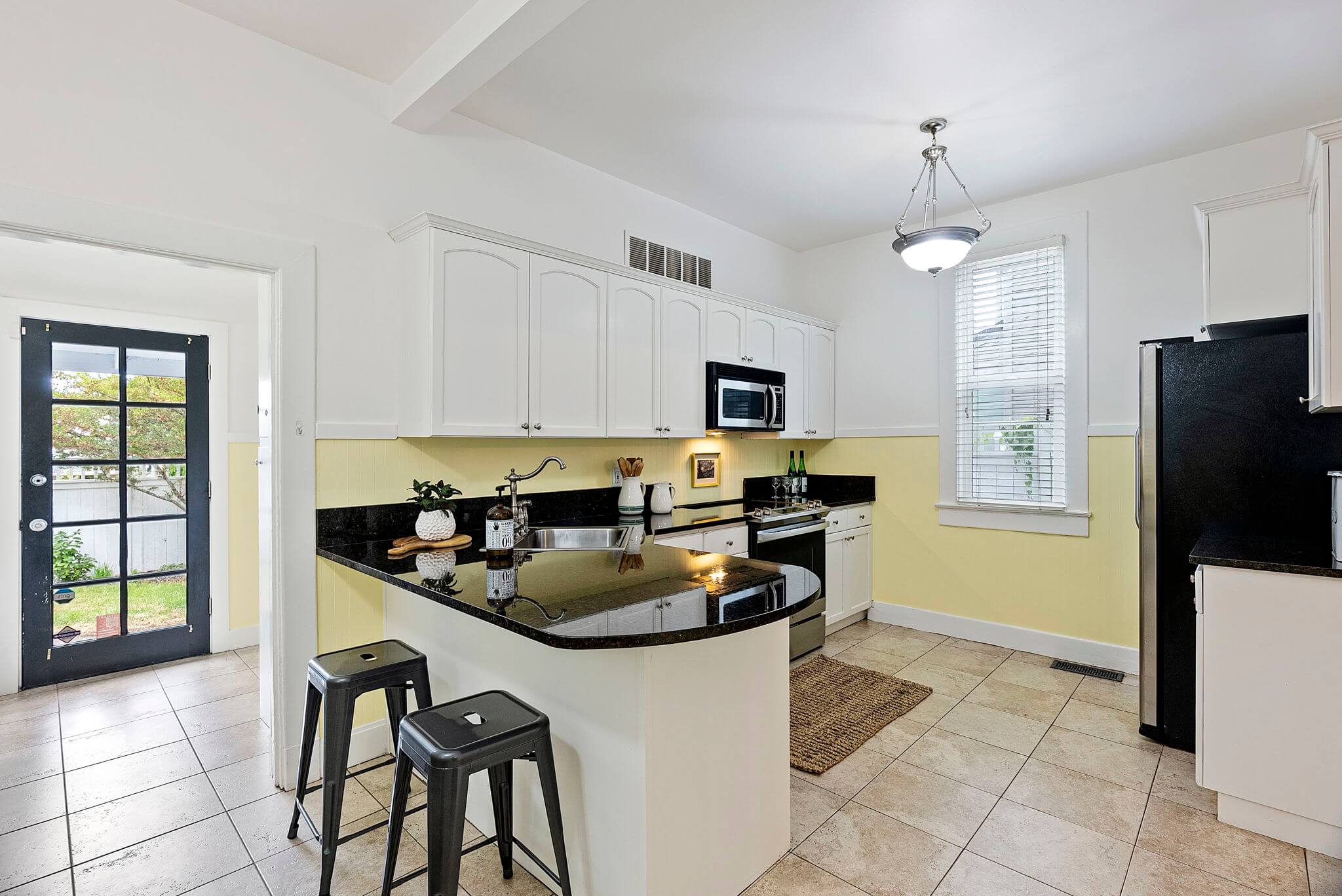 Updated eat-in kitchen with granite counters
