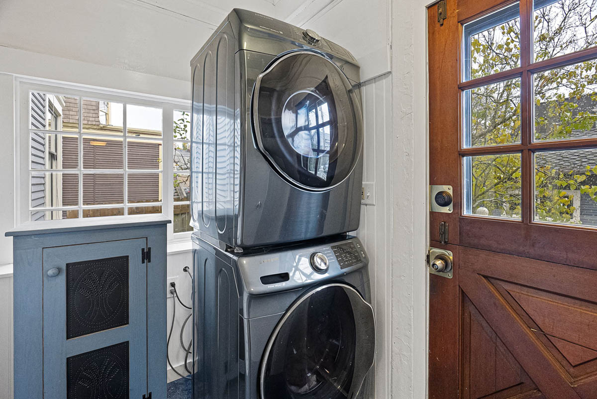 Laundry room off kitchen with Dutch door to back yard