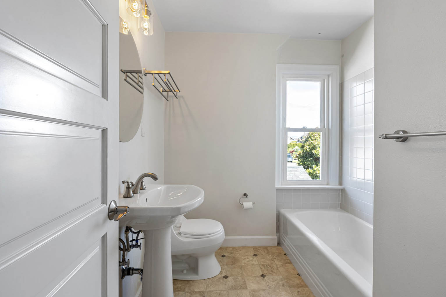 Hall bathroom with tub and shower