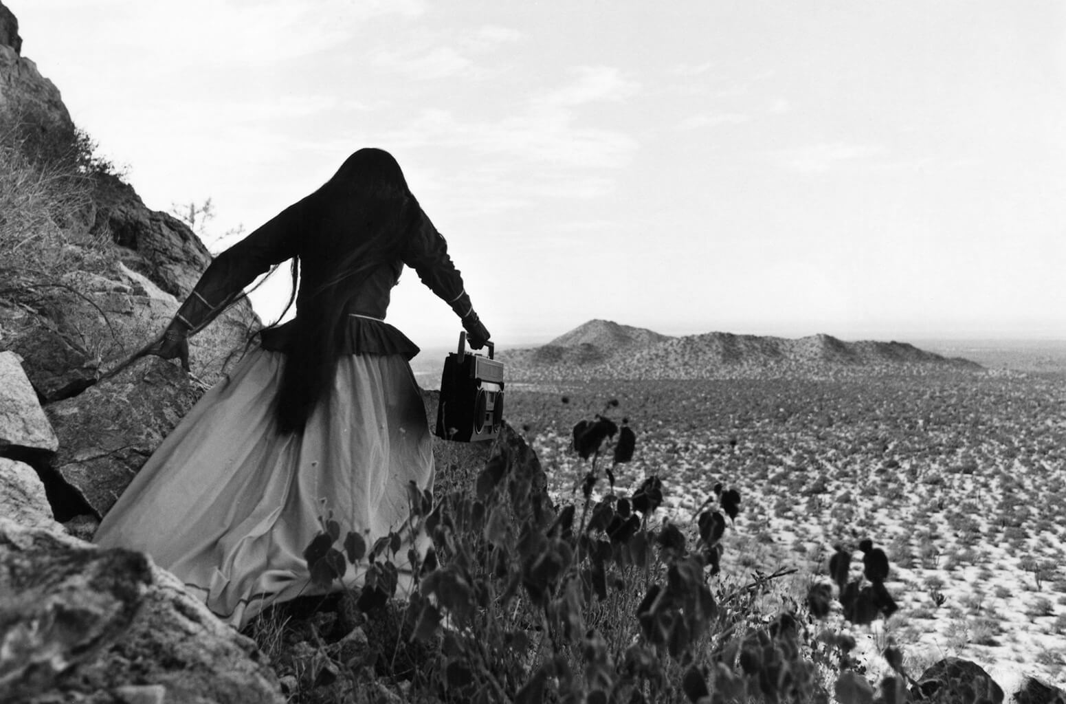 Graciela Iturbide (Mexican / Mexicana, b. / n. 1942). Mujer ángel, desierto de Sonora, México (Angel Woman, Sonora Desert, Mexico), 1979 negative, printed later