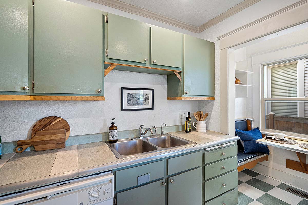Kitchen features a dishwasher and breakfast nook