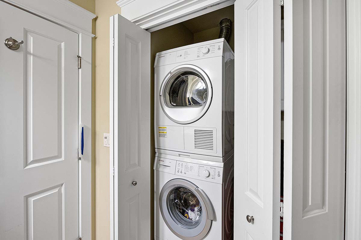 Laundry facilities are located in the second bathroom