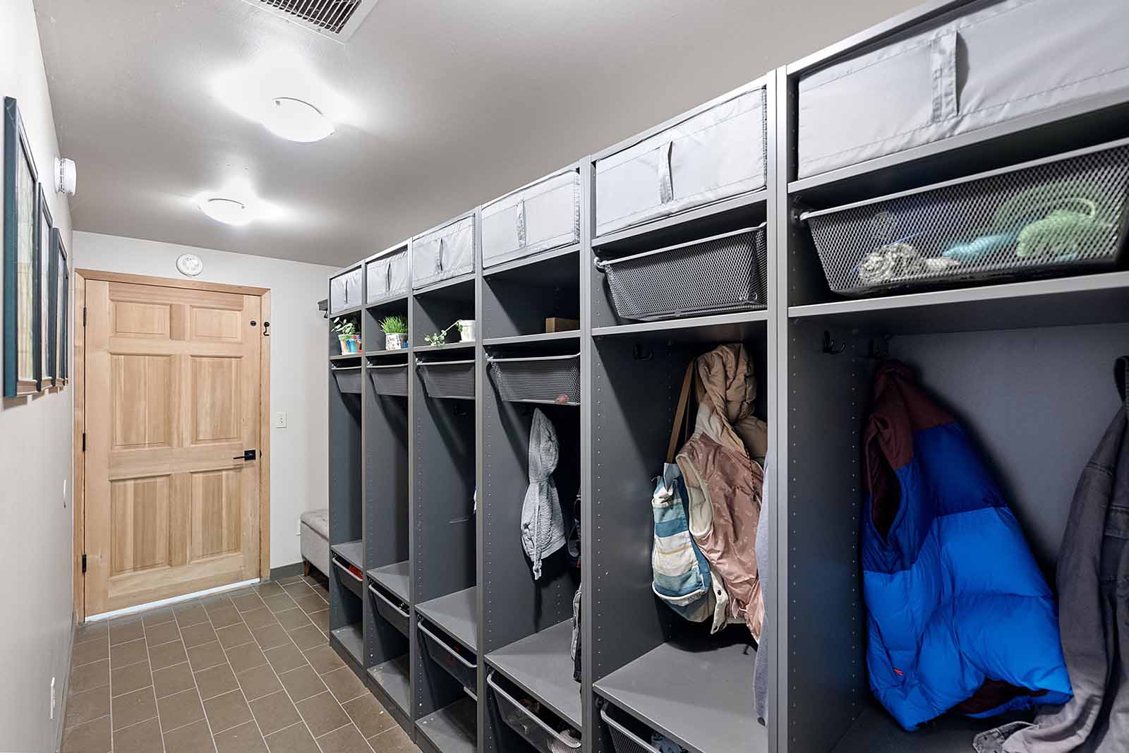 Mudroom on the lower level offers access to attached garage