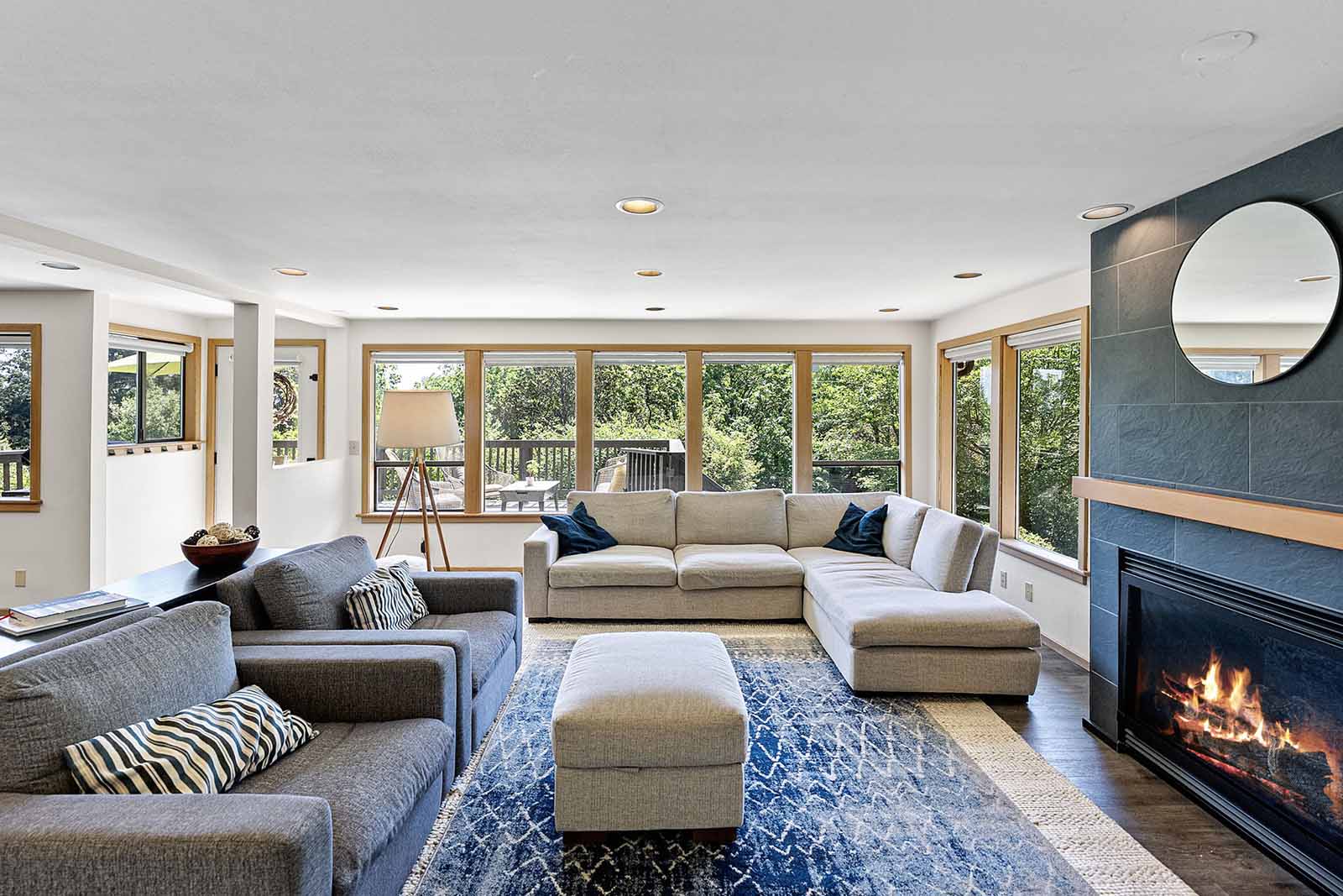 Living room with tree top views