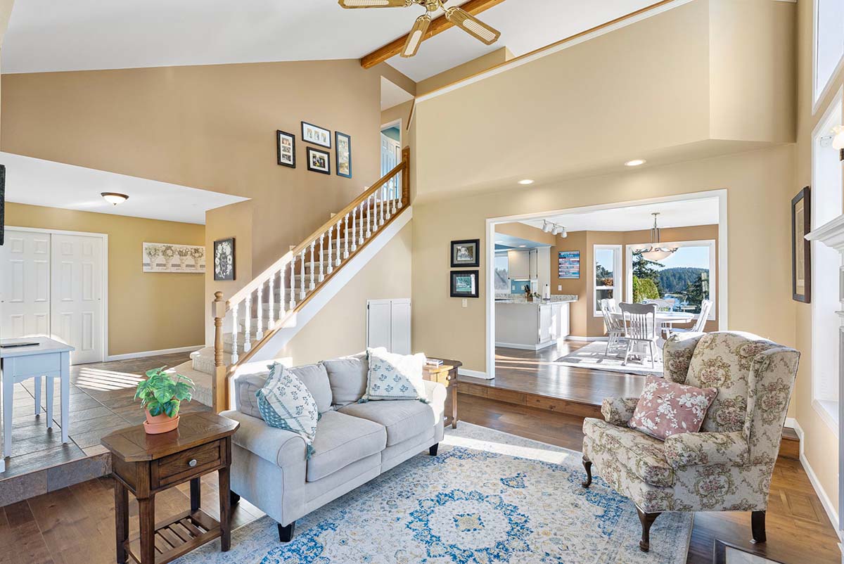 Living room leads to dining room and kitchen