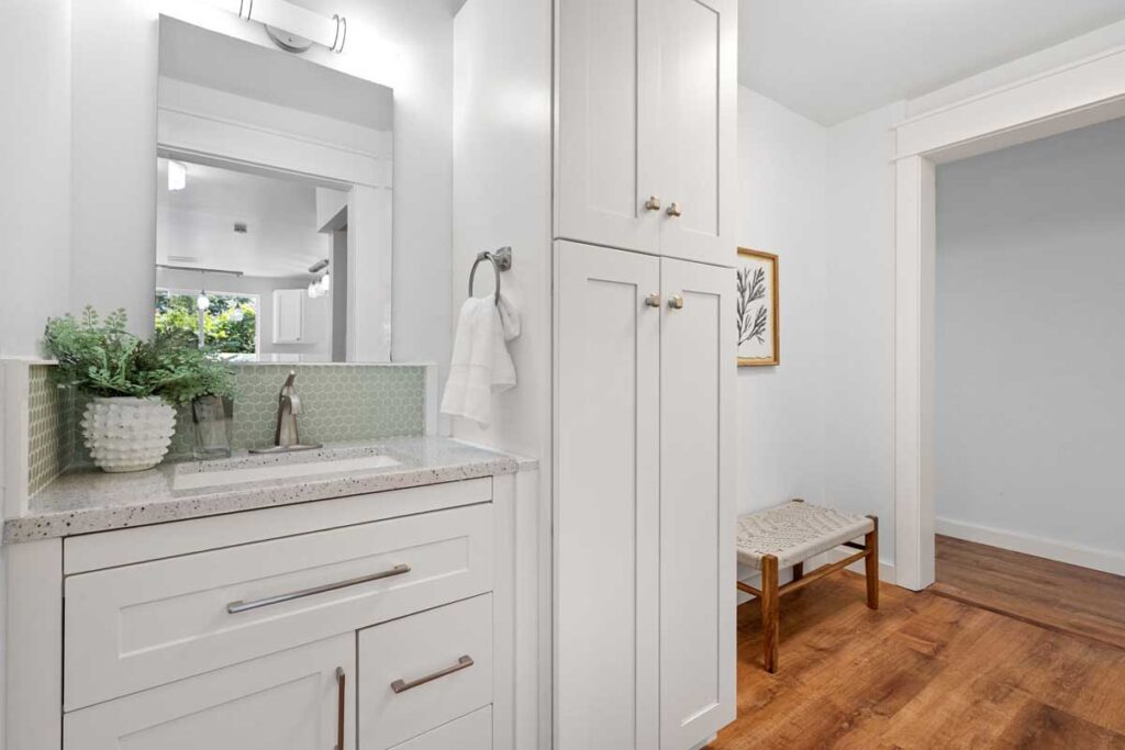 Half bathroom with ample linen storage