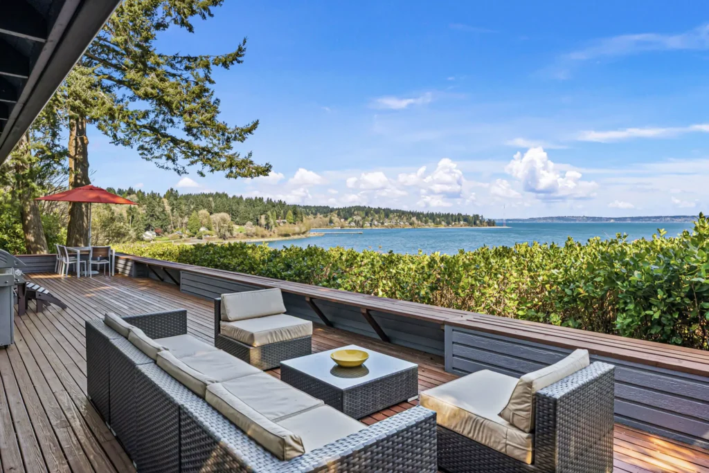 Outdoor living room with expansive views of Tramp Harbor. 8032 SW 222nd Place, Vashon