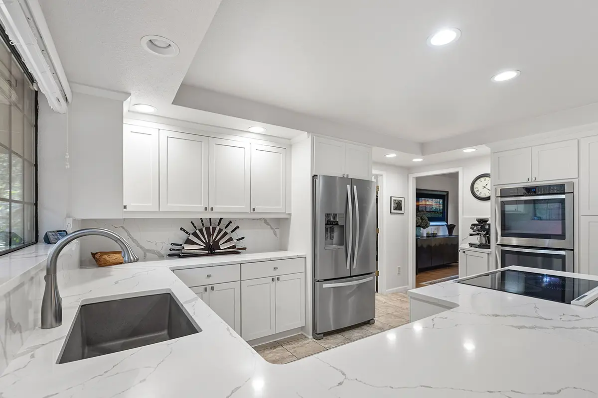 Updated kitchen with quartz counters and stainless appliances