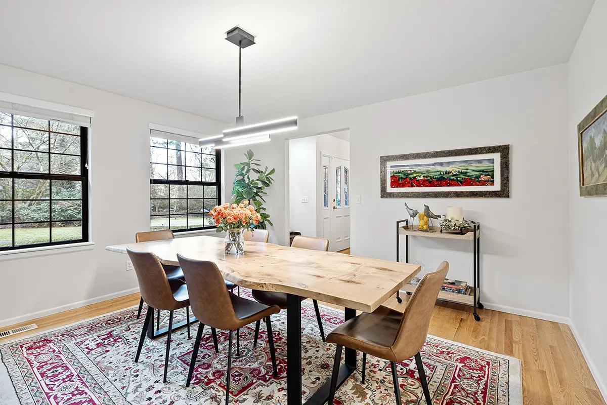 Formal dining room with hardwood floors
