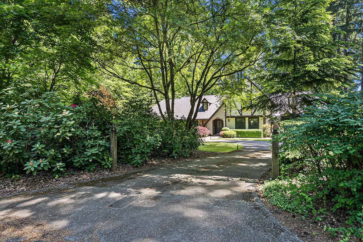 Mature landscaping provides privacy from the street