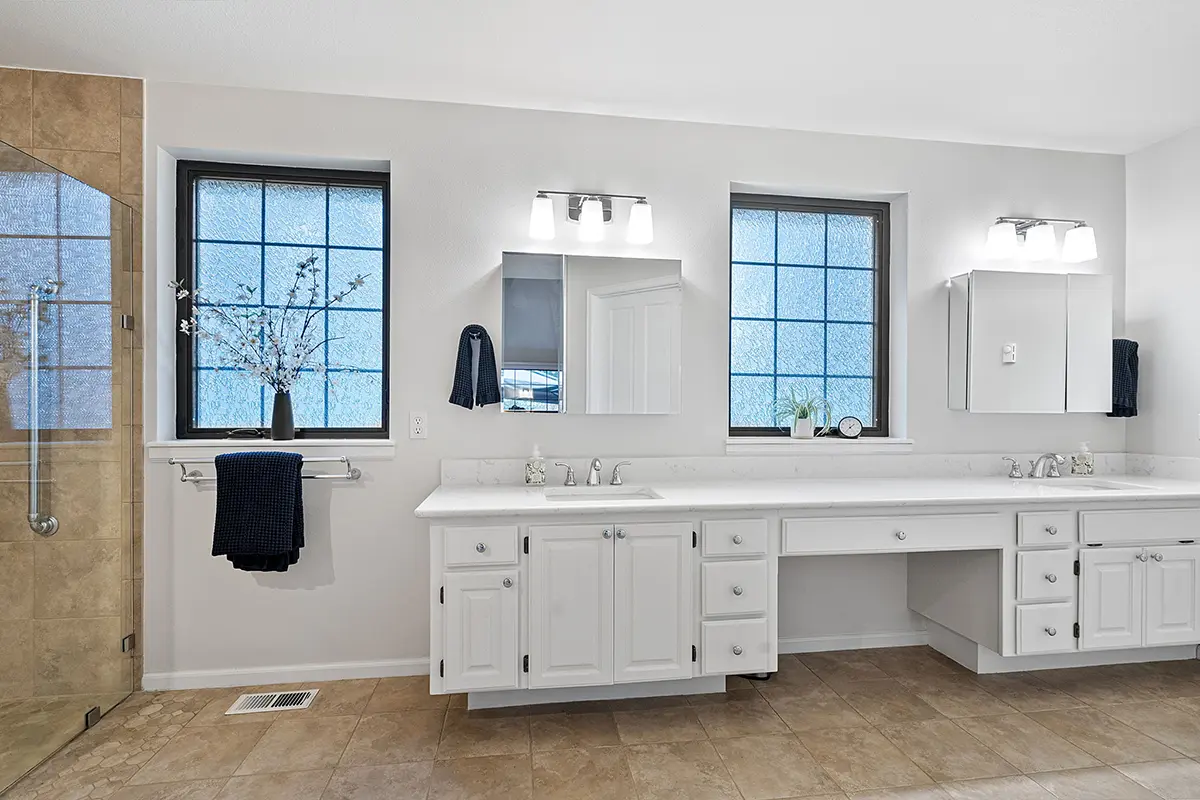 Primary bathroom with dual sink vanity