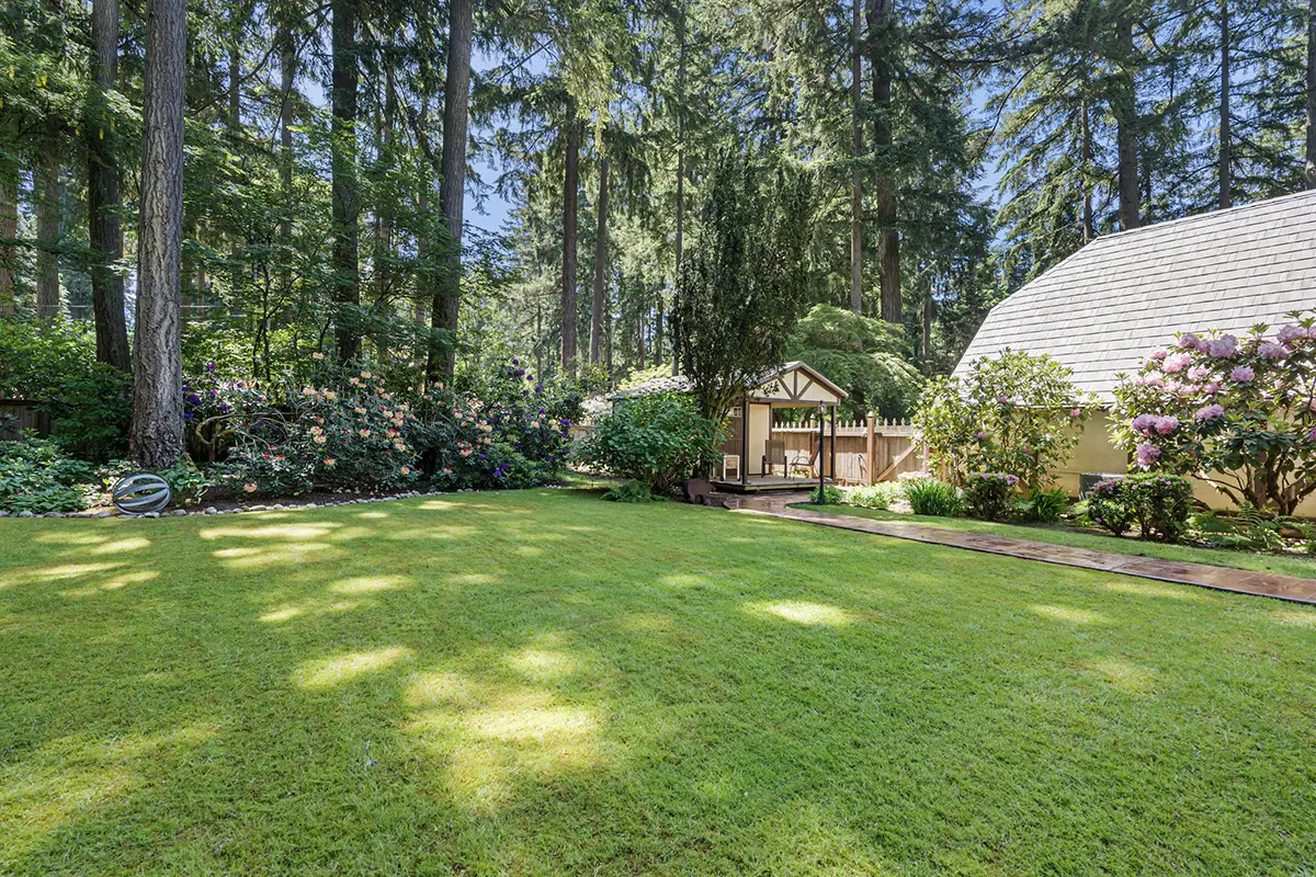 View towards utility shed and attached garage