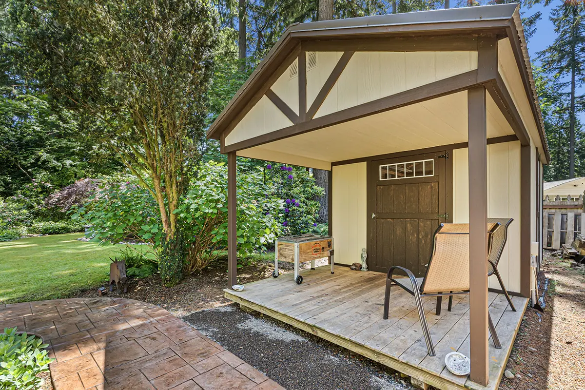Utility shed with covered front porch